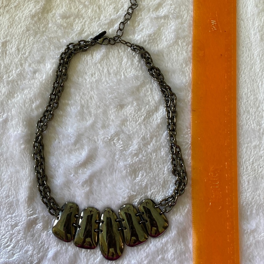 Metallic gray necklace.